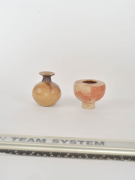 two small decorative forms