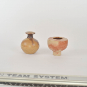 two small decorative forms