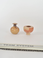 two small decorative forms