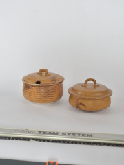 two serving bowls one spoon notch