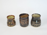 Three mugs small to large with text